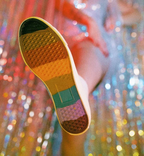 The rubber sole of a sneaker